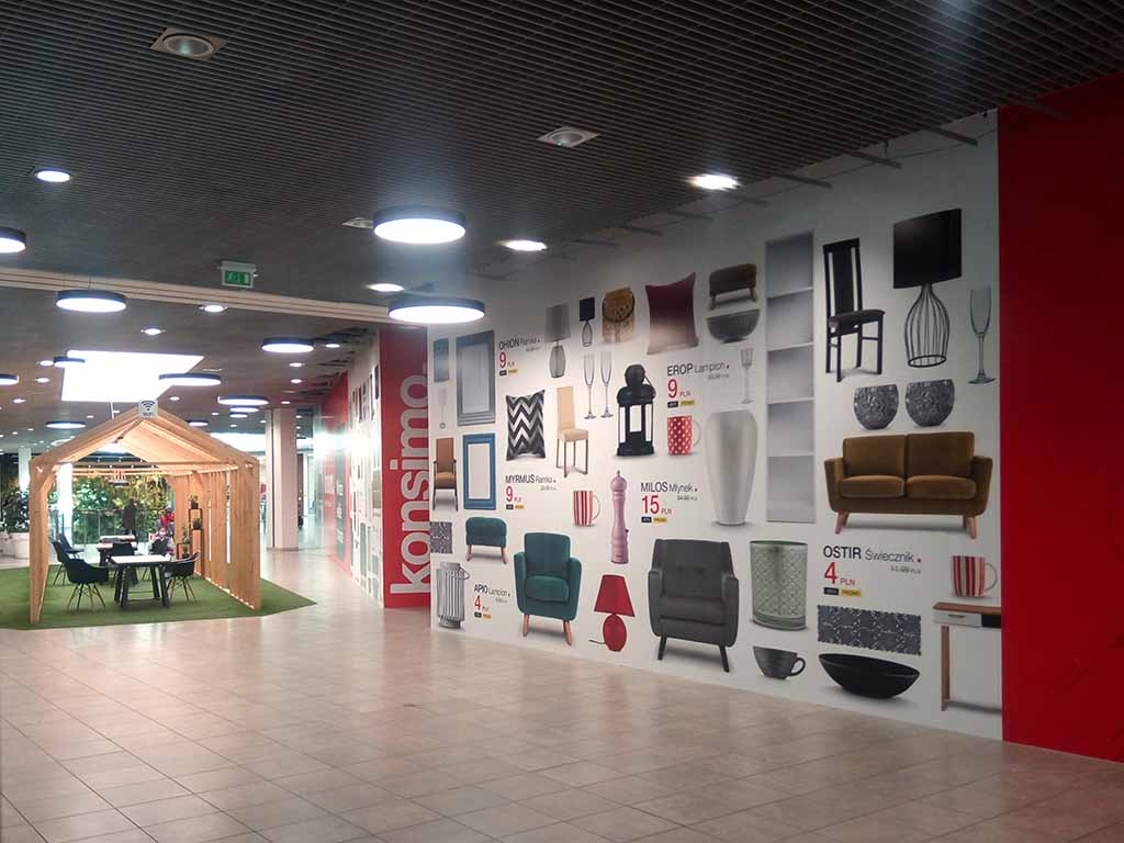 advertising on the walls Gdańsk Poland graphics on shopfront hoardings